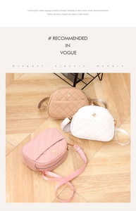 Close-up of quilted shell bags in beige white and pink with golden flower charms