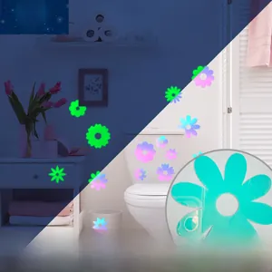 Luminous floral stair stickers with day and night glow effects in blue and pink