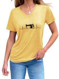 Close-up of sewing machine heartbeat print on yellow V-neck T-shirt with heather texture