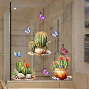 Watercolor cactus and colorful butterfly window stickers applied on shower glass door