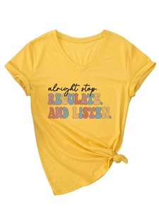 Detail of yellow V-neck t-shirt with text print and stylish front knot decoration