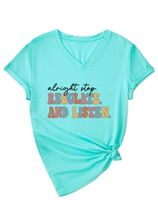 Detail of V-neck mint green t-shirt with retro text print and stylish front knot hem