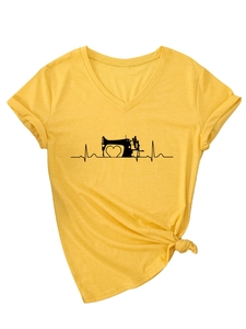 Detail of a bright yellow V-neck T-shirt with sewing machine heartbeat print and side knot