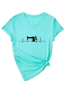 Detail of V-neck light blue T-shirt with sewing machine heart print and knot detail