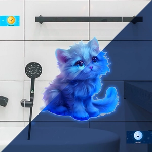 Luminous blue cat wall sticker showing daytime color and glowing night effect in bathroom