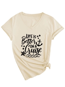 Detail of cream V-neck T-shirt with Life is Better on a Cruise print and knot hem