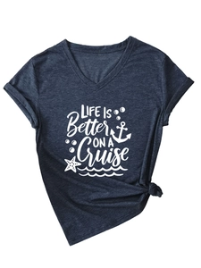 Detail of V-neck navy t-shirt featuring Life Is Better On A Cruise print and knot hem