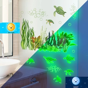 Luminous sea turtle and seaweed wall stickers showing daytime and glowing night effects