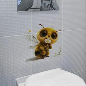 Glow-in-the-dark green bee wall sticker with daisy on white tile bathroom wall