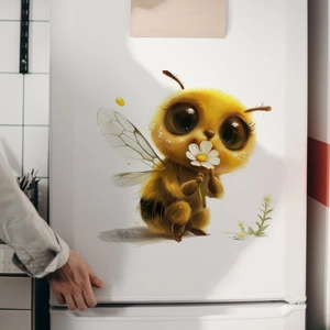 Luminous honey bee wall sticker with daisy on a white refrigerator in a modern kitchen