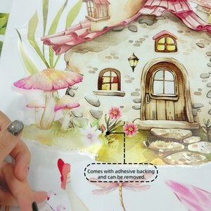 Detail showing self-adhesive backing and easy removal of cartoon mushroom wall decals