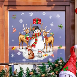 Christmas window stickers featuring cartoon snowman reindeer and snowflakes on glass