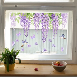 Purple wisteria window stickers with birds and butterflies on a glass window pane