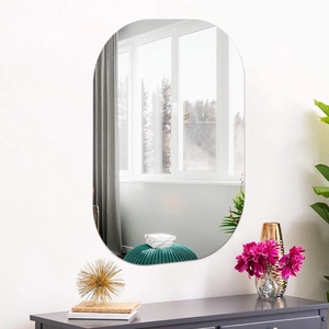 Modern frameless oval wall mirror with smooth edges for minimalist home decoration
