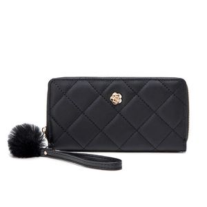 Classic black quilted long wallet for women with golden camellia flower and fur pompom