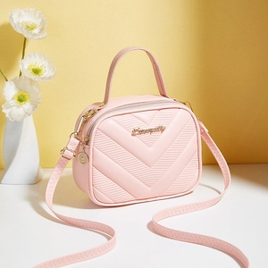 Pink V-quilted small square crossbody bag with gold hardware and top handle for women
