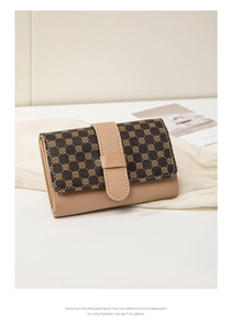 Detail showing high-quality lychee grain leather and vintage floral print on the wallet