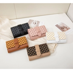 Flat lay of multiple color options for women short wallets with retro pattern detail