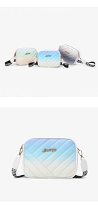 Close-up of quilted gradient crossbody bags with Luck For You logo and wide canvas straps