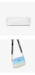 Detail view of stitched rectangular crossbody bag with gradient quilting and wide strap