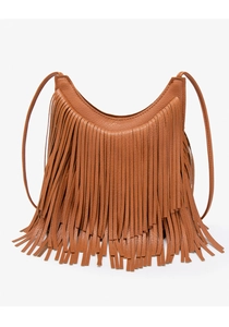 Close-up of caramel brown hobo bag featuring long leather tassels and lychee texture