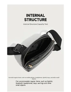 Internal view of glossy lychee leather chest bag showing compartments and gold zipper