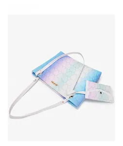 Detail of gradient tote bag set with heart-shaped quilting and gold hardware accents