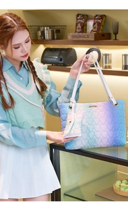 Detail of gradient tote bag set with heart quilting and matching small heart purse