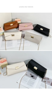 Detail view of colorful minimalist envelope chain bags with textured PU leather finish