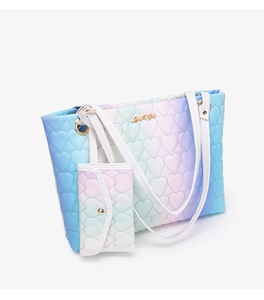 Detail of heart quilted gradient tote bag with Just For You metal logo and coin purse