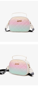 Detail of gradient quilted handbag with Lucky For You metal logo and wide woven strap