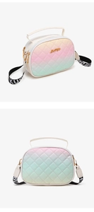 Detail of gradient crossbody bag with diamond quilting, gold logo and woven strap