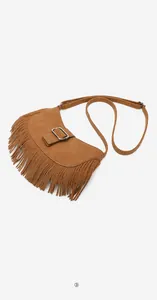 Detail of a brown suede hobo bag featuring decorative fringe and a metal buckle strap