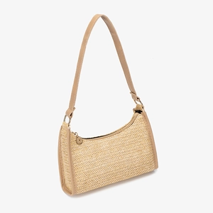 Fashionable woven underarm bag in beige straw with faux leather strap and gold hardware