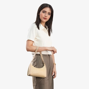 Summer woven beige underarm bag styled with a white polo shirt and khaki trousers