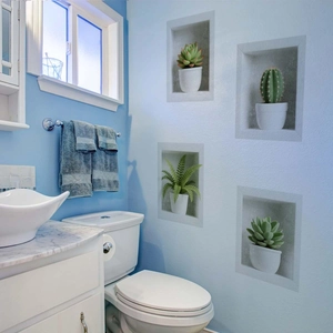 Self-adhesive 3D wall stickers featuring realistic potted green plants and succulents
