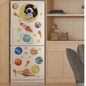 Space theme wall stickers featuring cartoon astronauts and planets in a modern home kitchen