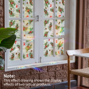 Christmas window cling with red berries and pine needles showing rainbow light effect