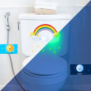 Luminous rainbow and stars toilet sticker showing day and night glowing effect