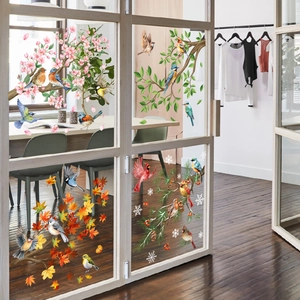 Detail of double-sided glass stickers with seasonal birds, cherry blossoms and maple leaves