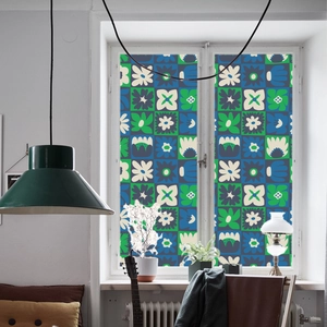 Macro shot of retro floral patterned glass film for windows in a bright home setting