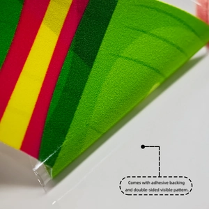 Detail of double-sided Christmas sock wall sticker with adhesive backing and vivid stripes