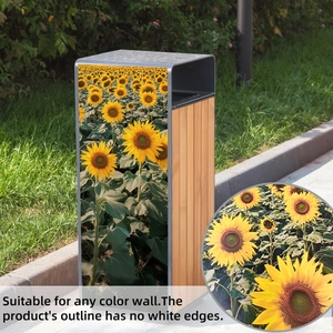 Detail of sunflower waste bin stickers showing seamless edges on outdoor utility boxes