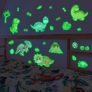 Glow in the dark dinosaur wall decals set for kids bedroom decor with glowing volcano