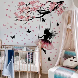 Pink cherry blossom branch and girl on swing wall sticker for nursery decor