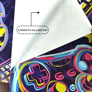 Close-up of self-adhesive gaming wall sticker peeling from backing paper for any color wall