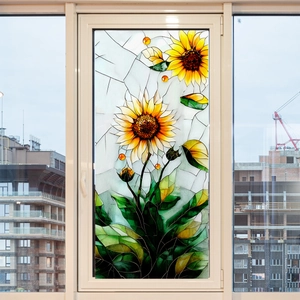 Detailed texture of sunflower stained glass window film on a white sliding frame