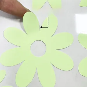 Détail d'autocollants muraux autocollants en forme de marguerite verte fluorescente déco