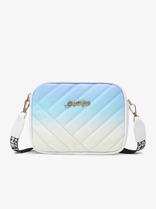 Close-up of blue gradient quilted crossbody bag with gold Luck For You metal logo
