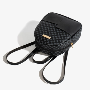 Mini zaino retrò da donna con motivo a pois e design in pelle nera elegante